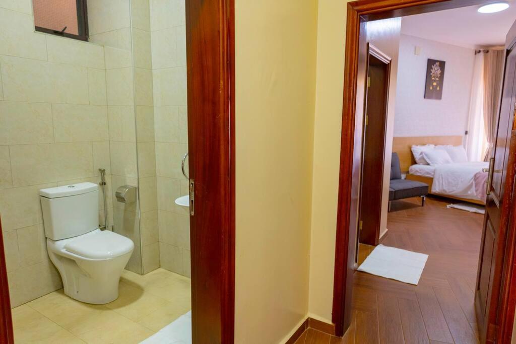 Stunning & Calm 2 Bedroom Gate Away In Entebbe- Sand Grains Residences A03 Namulanda Exterior photo